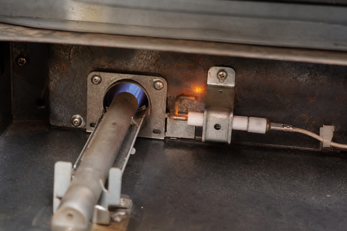 Gas oven igniter and burner assembly during a heating test
