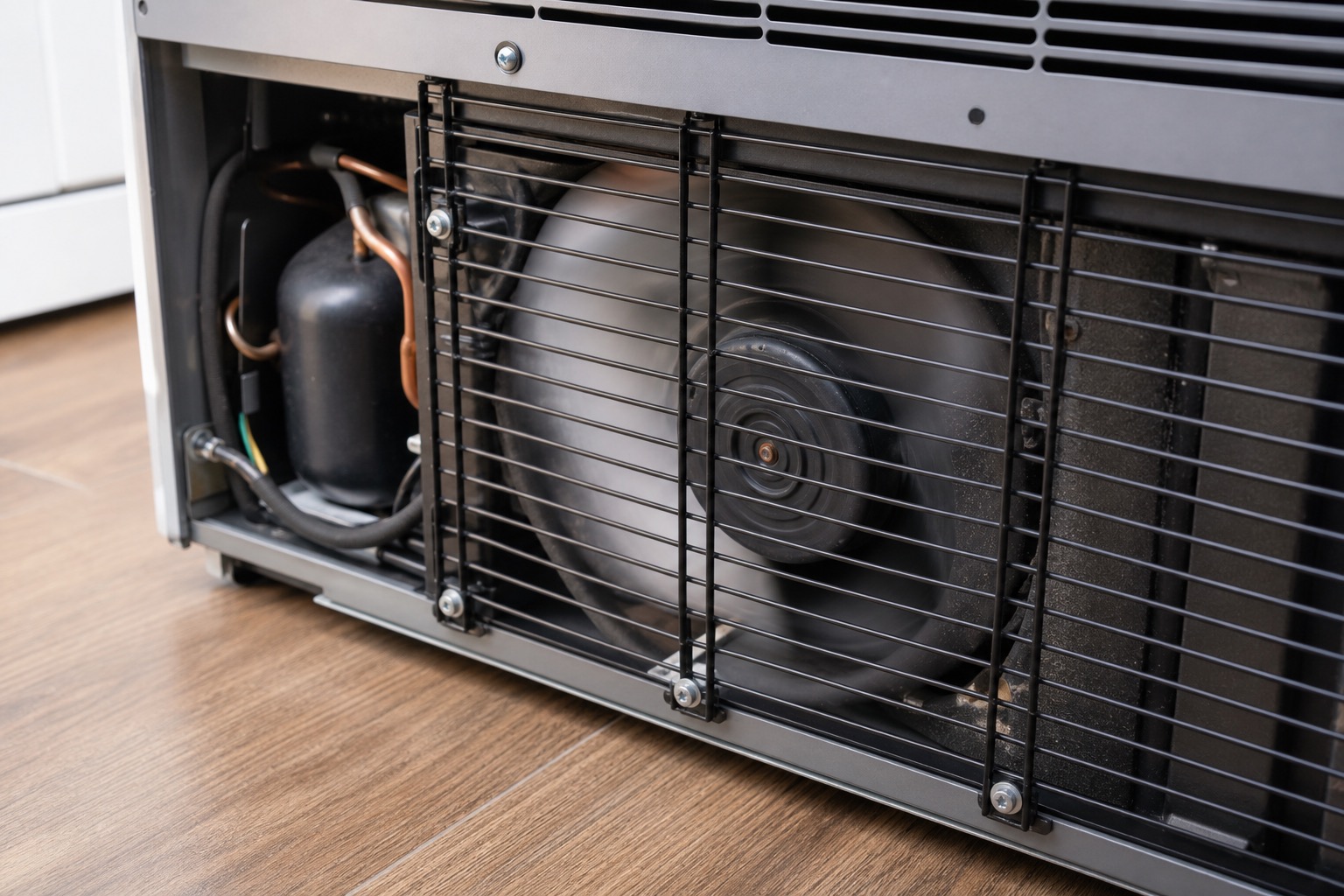 Condenser fan grille area related to refrigerator buzzing noise