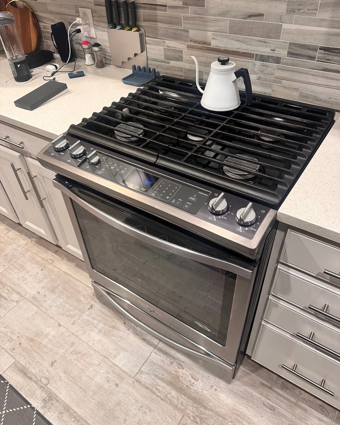 Whirlpool gas range and oven in the kitchen.