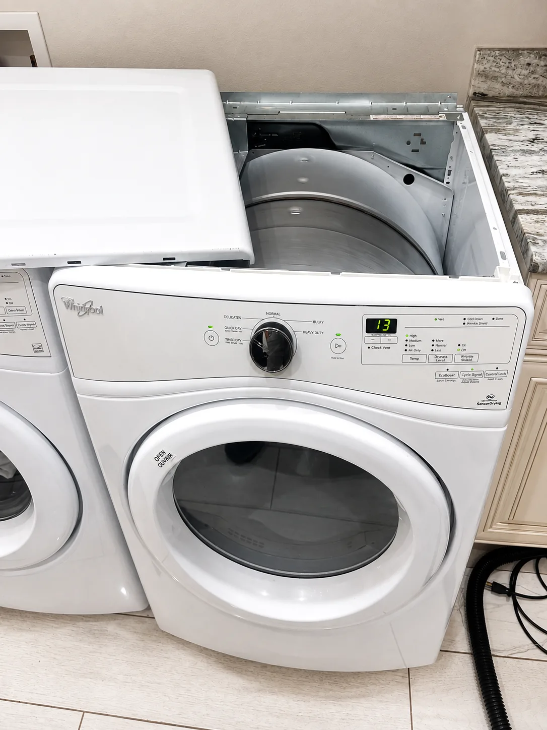 Whirlpool WED75HEFW0 dryer disassembled during a Cape Coral no heat repair