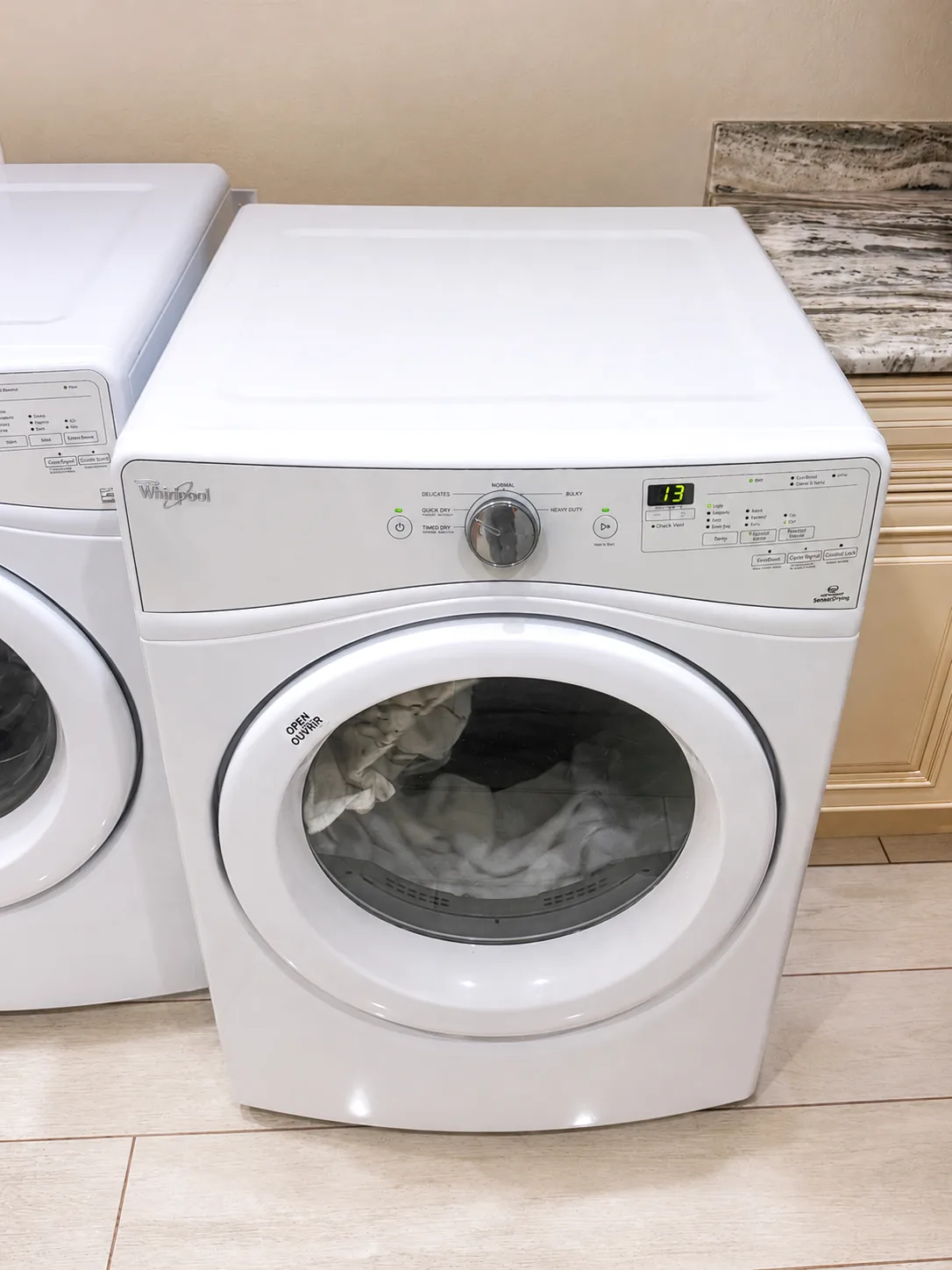 Whirlpool WED75HEFW0 electric dryer repaired during a Cape Coral no heat service call