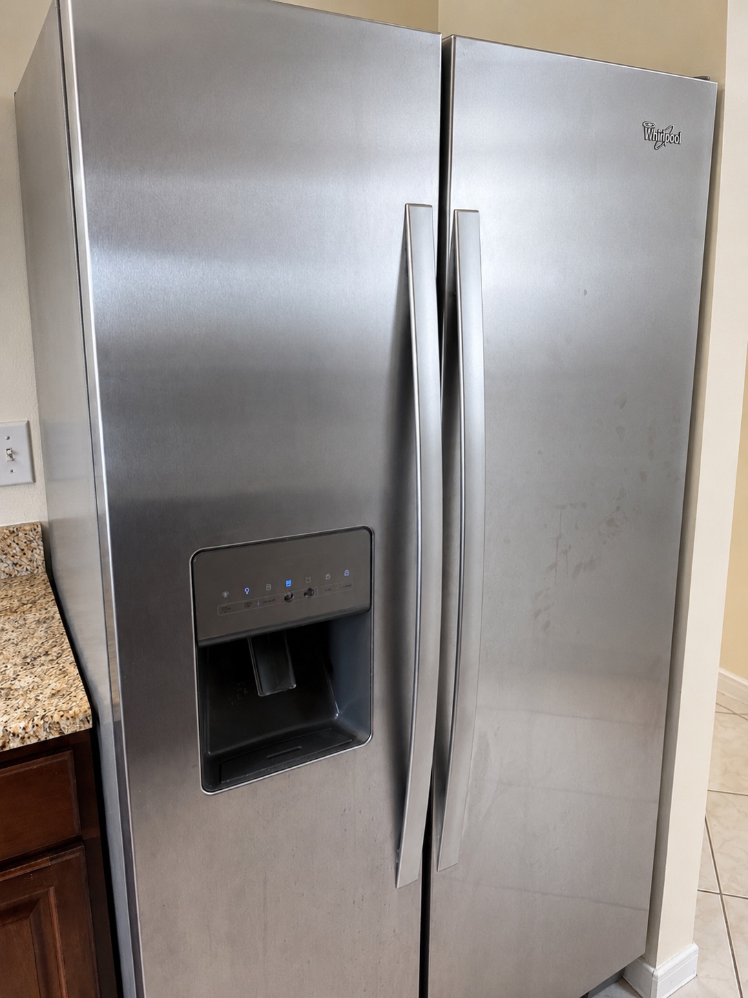 Whirlpool WRS325FDAM02 refrigerator serviced during an appliance repair visit in Cape Coral, Florida