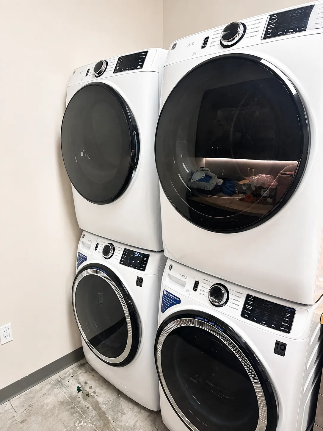 GE GFW550SSN5WW commercial washer at a golf club service location in Estero Florida