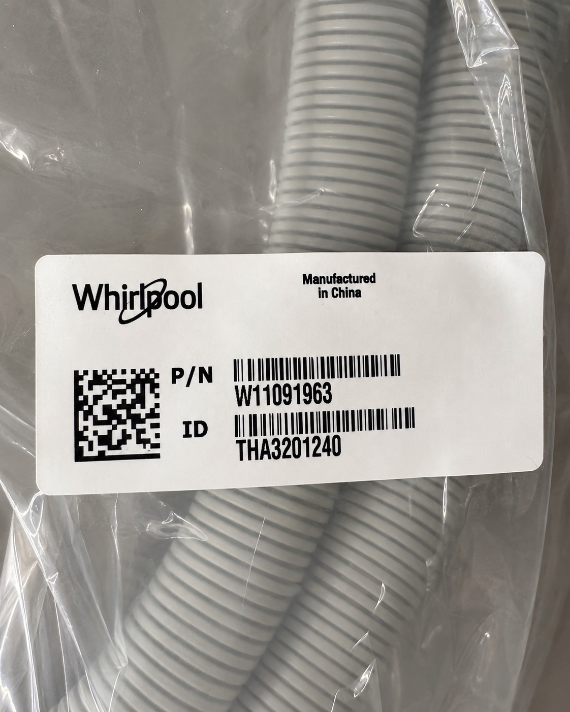 Whirlpool W11091963 replacement washer drain hose used during an Estero repair